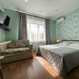 Гостиница Матрёшка Тольятти Стандарт с двуспальной кроватью и односпальным диваном-1